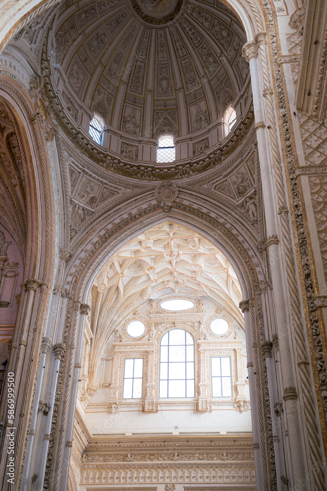 Arches and columns of the Mosque-Cathedral of Cordoba, Andalusia, Spain.