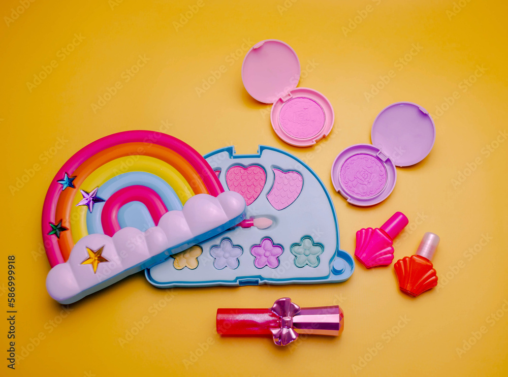 Φωτογραφία Children's set of decorative cosmetics for a little girl in the shape of a rainbow