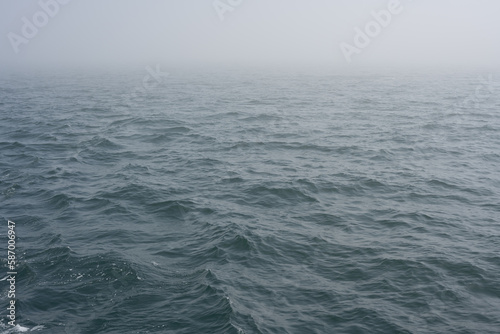 fog and waves on the sea