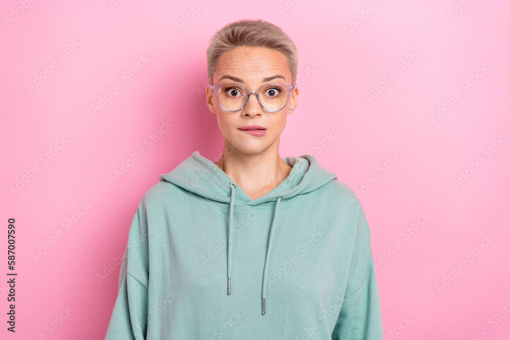 Photo portrait of lovely young lady confused facial expression bite lips dressed stylish khaki outfit isolated on pink color background