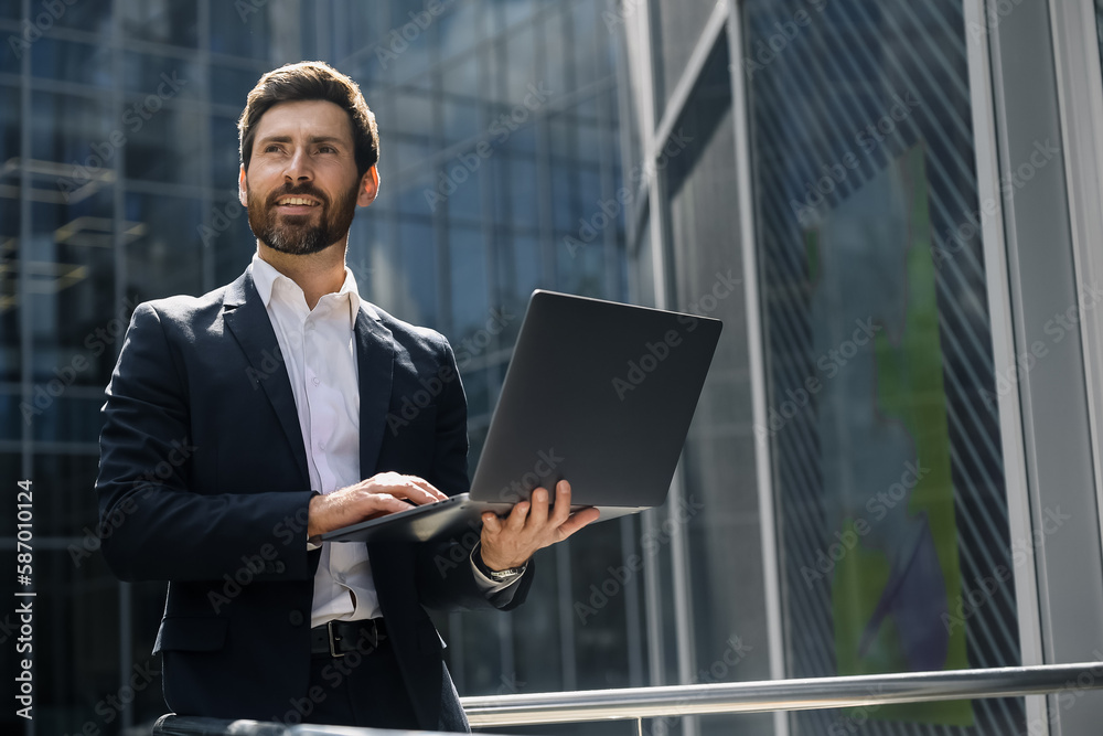 Elegant manager looking confident and determined Elegant manager looking confident and determined