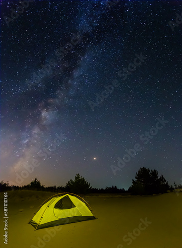 small touristic tent stay among sandy desert under starry sky, night travel camp scene