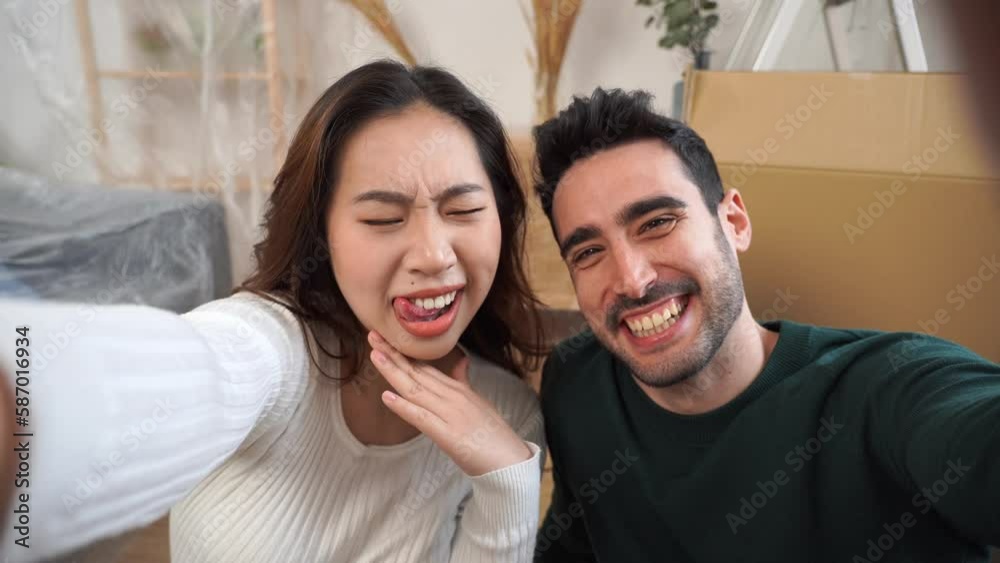 Happy couple taking selfie on smartphone Happy couple taking selfie on smartphone