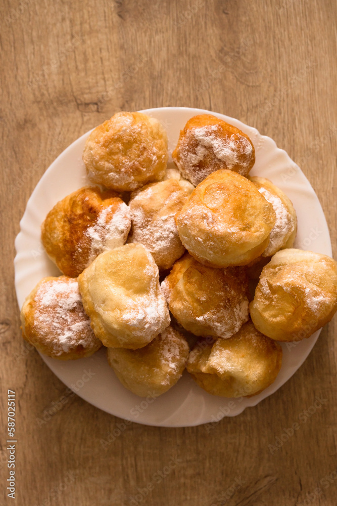 fragrant donuts sprinkled with powdered sugar fragrant donuts sprinkled with powdered sugar