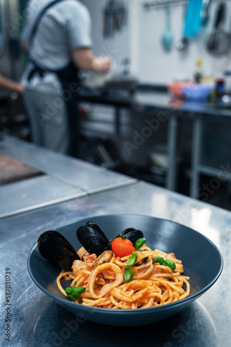 Chef preparing Seafood Past...