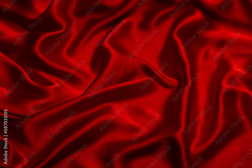 Obraz premium Red silk or satin luxury fabric texture can use as abstract background.