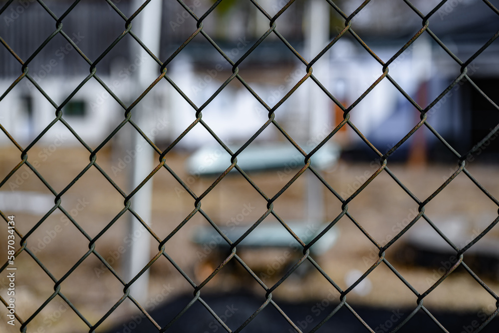 Chainlink fence in front of a business that closed due to the pandemic. A business that closed because of hard times is still vacant in Binghamton in Upstate NY. Chainlink fence in front of a business that closed due to the pandemic. A business that closed because of hard times is still vacant in Binghamton in Upstate NY.