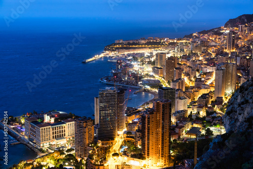 Monte Carlo panorama illuminated by night. Urban landscape with luxury architecture.