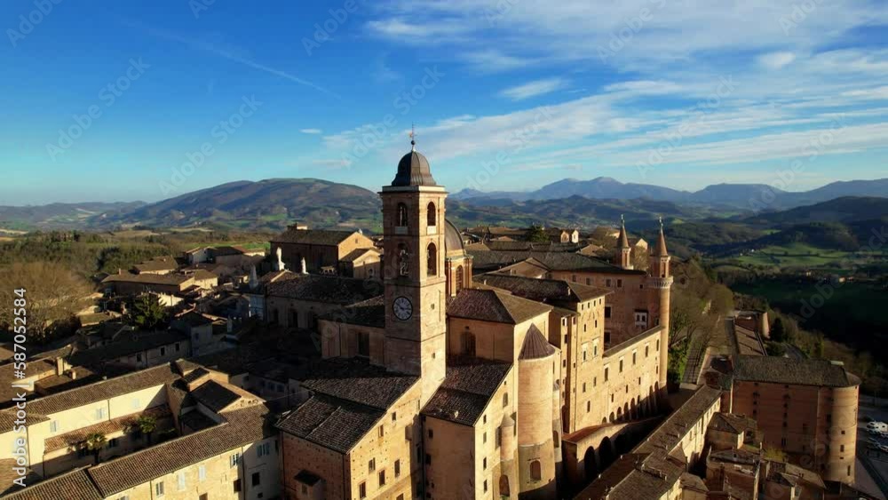 One of the most beautiful medieval towns of Italy - Urbino in Marche region. aerial drone panoramic high angle view over sunset One of the most beautiful medieval towns of Italy - Urbino in Marche region. aerial drone panoramic high angle view over sunset
