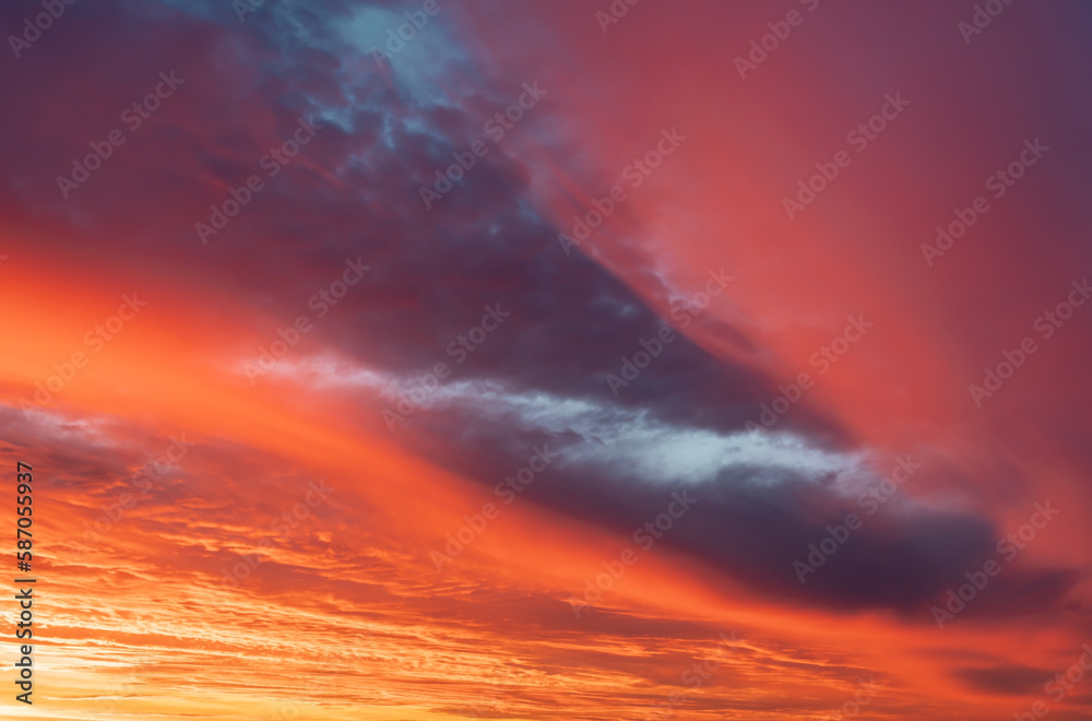 Pink and purple clouds at sunset. Sky panorama background