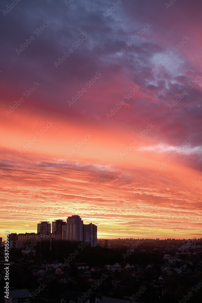 Pink and purple clouds at sunset. Sky panorama background