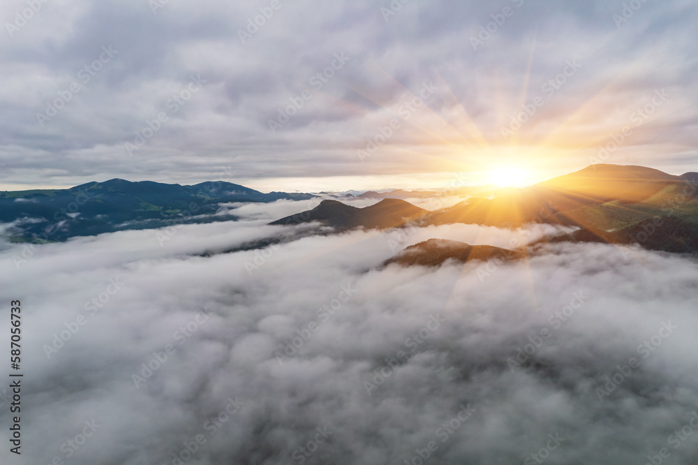 Peaceful scene of misty mountains. Location place of Carpathians mountains, Ukraine, Europe. Photo wallpaper. Aerial photography, top view drone shot.