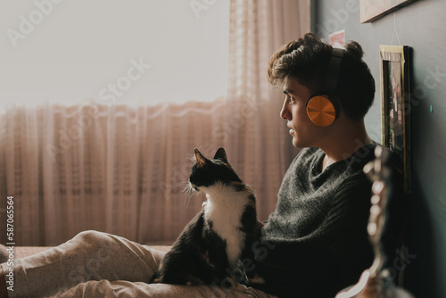 guy with his pet lookinng trhough the window