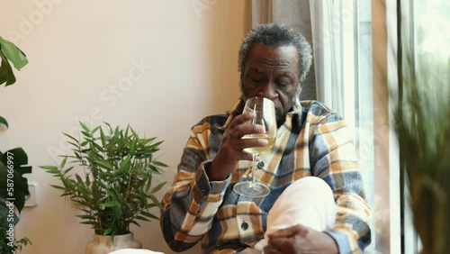 Wallpaper Mural african old man drinks alcoholic wine sad depression Torontodigital.ca