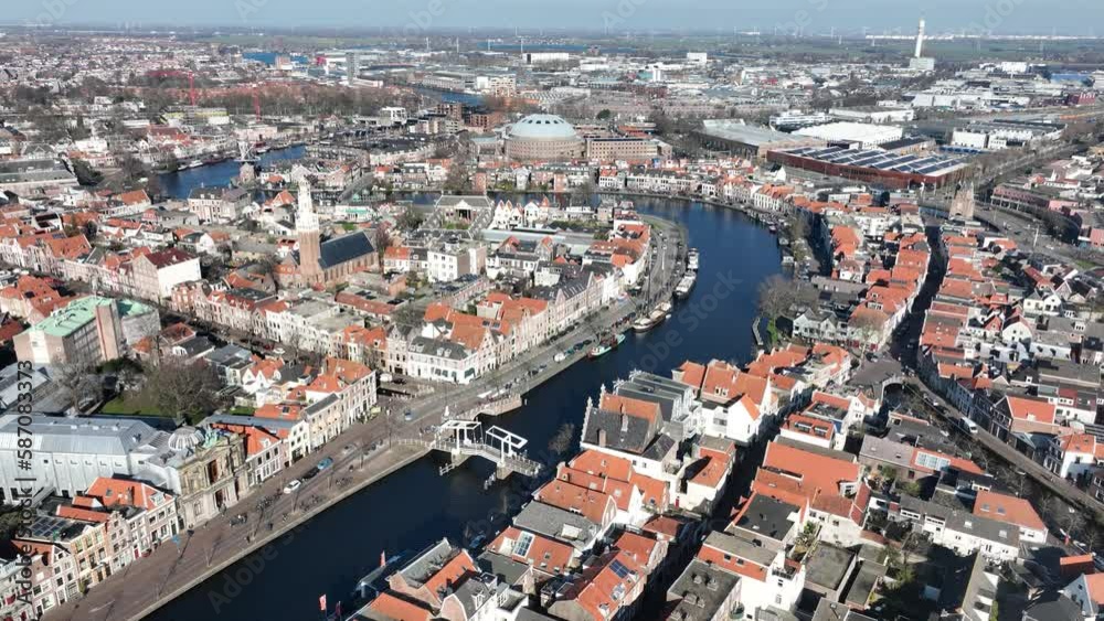 Mesmerizing aerial view of the charming historic center of Haarlem, showcasing the beautiful architecture and picturesque canals. Mesmerizing aerial view of the charming historic center of Haarlem, showcasing the beautiful architecture and picturesque canals.