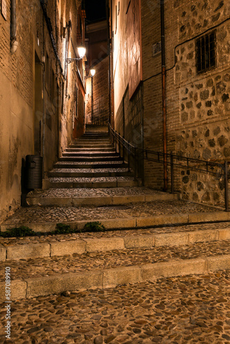 Narrow streets and Facades of historic houses in Toledo