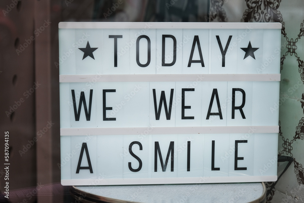 today we wear a smile signpost text today we wear a smile signpost text