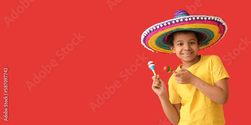 Funny Mexican boy in sombre...