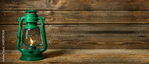 Vintage petrol lamp on wood...