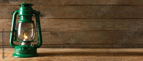 Vintage petrol lamp on wood...