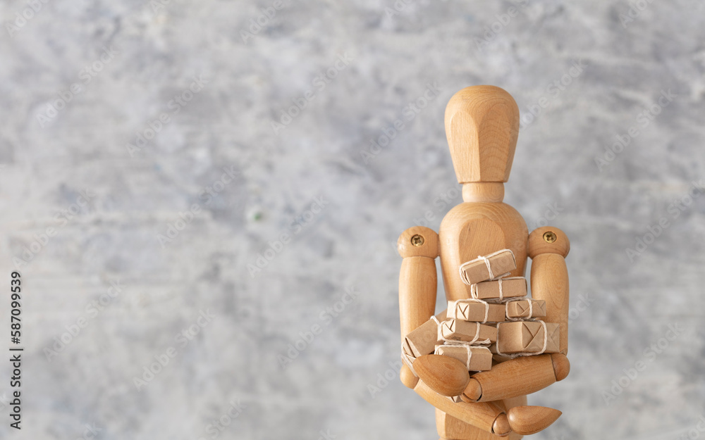 Wood model overflowing with packages, on white background. Wood model overflowing with packages, on white background.