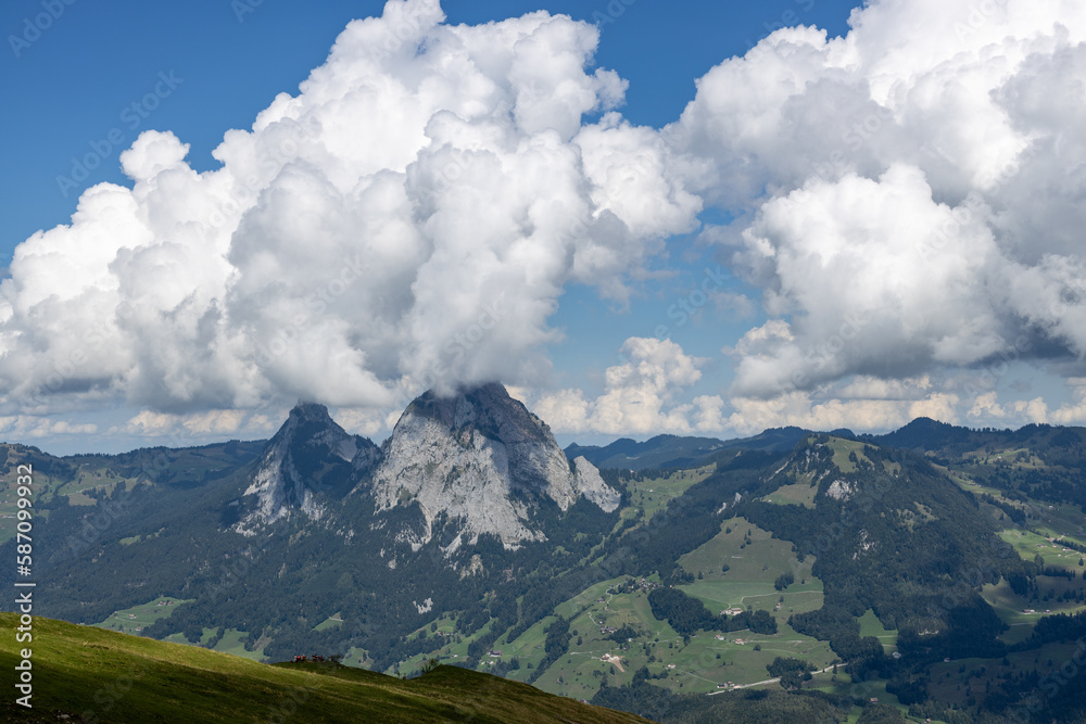 Beautiful view of the Swiss mountains with clouds.