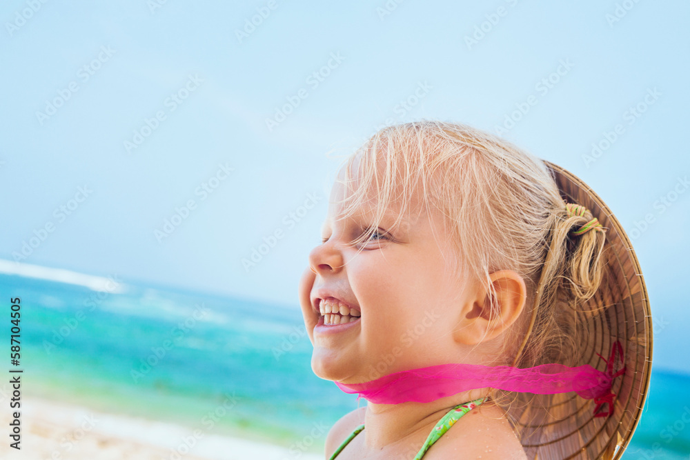 Funny face portrait of happy child in vietnamese straw hat Funny face portrait of happy child in vietnamese straw hat