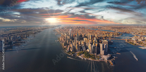 Beautiful sunset over Manhattan island in New York city. Aerial New York view from above.