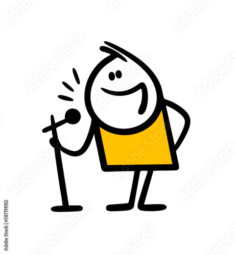 The famous artist performs on the stage of the theater with a microphone and tells jokes, sings.