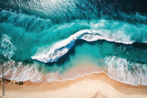 Blue ocean waves washing up on a sandy beach, seen from above. Generative AI