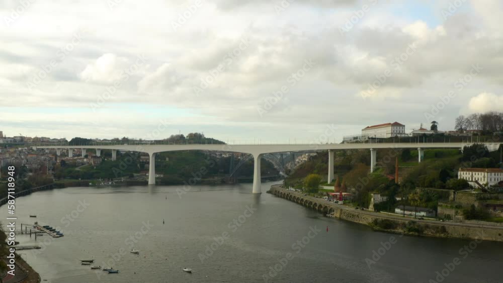 Portugal Porto aerial video city centre. Aerial view of old town and Dom Luis Bridge over the Douro river. Drone Footage Travel Architecture Clerigos Church Tower Baroque Style Cityscape. Portugal Porto aerial video city centre. Aerial view of old town and Dom Luis Bridge over the Douro river. Drone Footage Travel Architecture Clerigos Church Tower Baroque Style Cityscape.