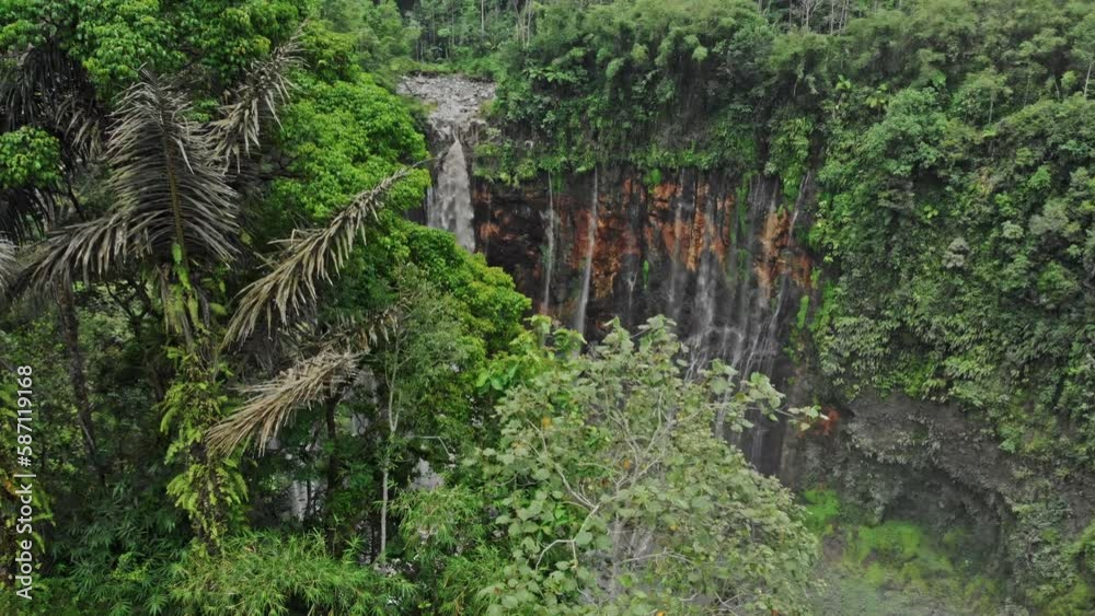 Tumpak Sewu Waterfalls are a tourist attraction in East Java, Indonesia Tumpak Sewu Waterfalls are a tourist attraction in East Java, Indonesia