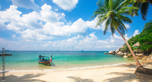 Fototapeta Naklejka Na Ścianę i Meble -  Tropical beach with coconut palm and longtail boat