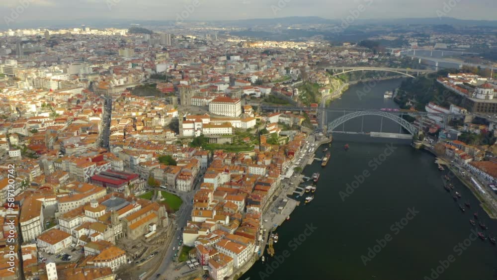 Portugal Porto aerial video city centre. Aerial view of old town and Dom Luis Bridge over the Douro river. Drone Footage Travel Architecture Clerigos Church Tower Baroque Style Cityscape. Portugal Porto aerial video city centre. Aerial view of old town and Dom Luis Bridge over the Douro river. Drone Footage Travel Architecture Clerigos Church Tower Baroque Style Cityscape.