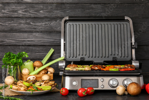 Electric grill with assorte...