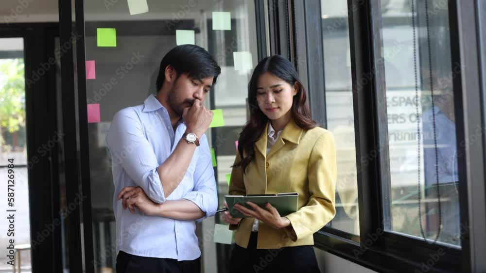 Asian creative business people meeting together thinking on new business ideas in office, Analysis chart presentation. Asian creative business people meeting together thinking on new business ideas in office, Analysis chart presentation.