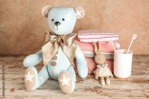 Toy bear with bunny, baby c...