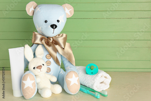 Toy bear and bunny with bat...