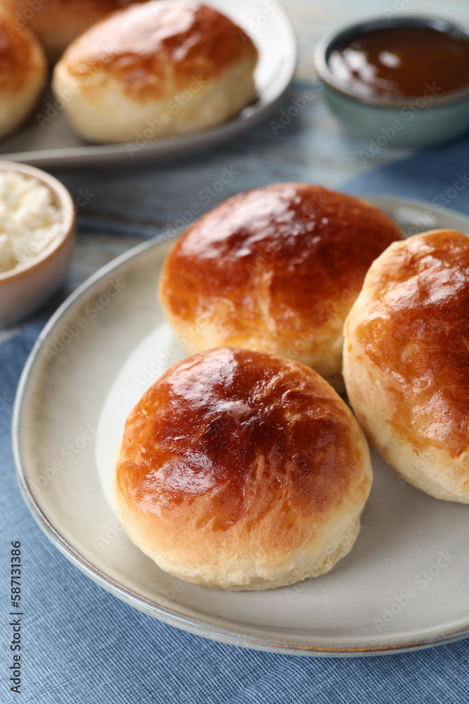 Tasty scones prepared on soda water on table, closeup Tasty scones prepared on soda water on table, closeup