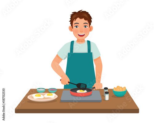 Young man cooking fried egg with frying pan in the kitchen