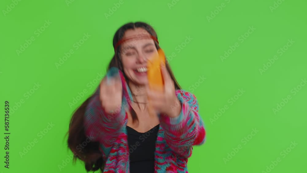 Happy excited joyful hippie woman girl in shirt use smartphone typing browsing shouting say wow yes found out great big win, good news, lottery goal achievemen, celebrating success, winning game Happy excited joyful hippie woman girl in shirt use smartphone typing browsing shouting say wow yes found out great big win, good news, lottery goal achievemen, celebrating success, winning game