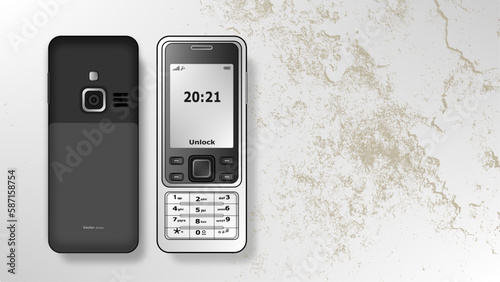 mobile feature phone on grunge wallpaper