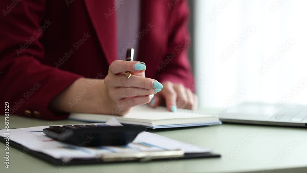 Businesswoman working with document paper at desk in home office, businesswoman or secretary online working.