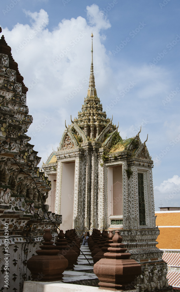 Transport yourself to the majestic Wat Arun temple in Bangkok, Thailand - a breathtaking display of intricate craftsmanship and rich cultural heritage. Transport yourself to the majestic Wat Arun temple in Bangkok, Thailand - a breathtaking display of intricate craftsmanship and rich cultural heritage.