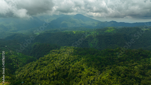 Mountain slopes covered with rainforest and jungle view from above. Negros  Philippines