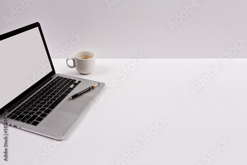 I am taking a break from my laptop, coffee cup, pen, etc