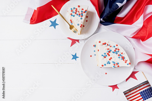 Sweet cake with usa flag colored sprinkles and stars , flag background photo