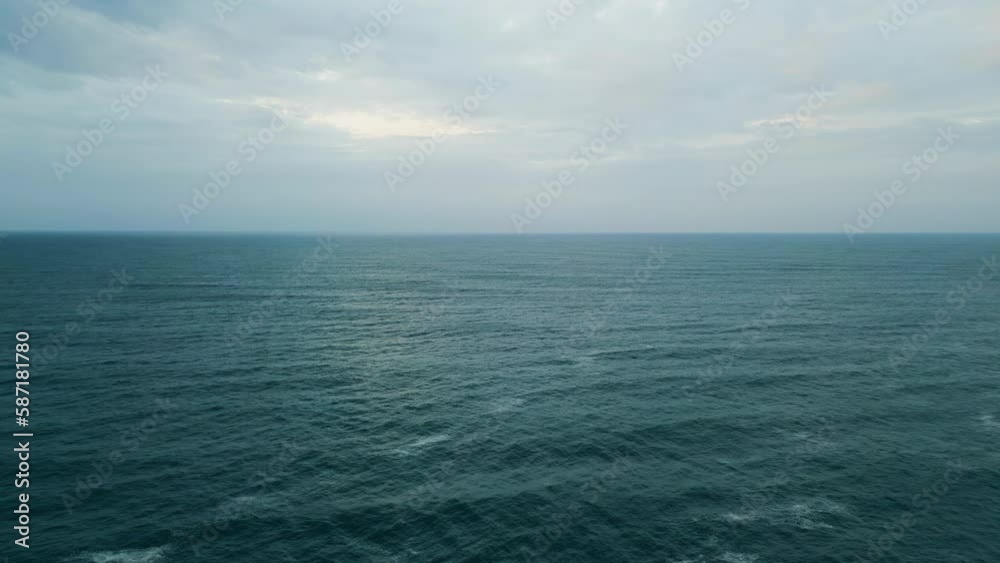 Amazing cloudy seascape beautiful ocean under gray sky. Aerial marine horizon. Amazing cloudy seascape beautiful ocean under gray sky. Aerial marine horizon.