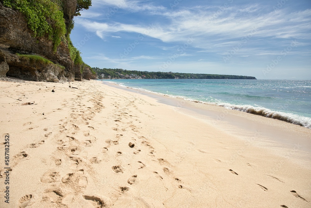 Dreamland beach in Uluwatu, Bali, Indonesia, with its majestic cliffs on the beach.