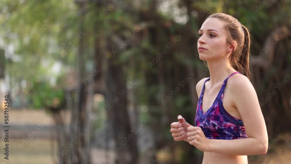 Young woman running on sunny day, attractive woman exercising in outdoor, Young woman running on sunny day, attractive woman exercising in outdoor,